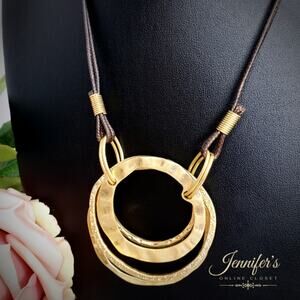 3/$25 Four Brushed Gold Round Pendants on a Brown Leather Corded Necklace